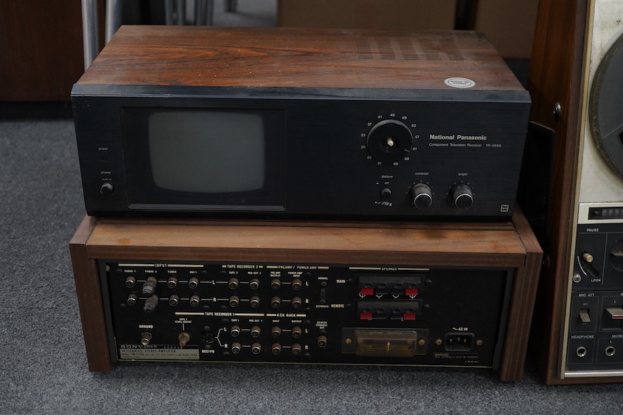 A pair of floorstanding IMF speakers, together with a Sony three-head reel to reel tape recorder, a National Panasonic compact television TR-565G, a Sony integrated stereo amplifier TA-1150, a turntable, a Pioneer tuner